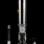 Clear glass bong with detachable downstem and bowl, studio shot on black reflective surface.