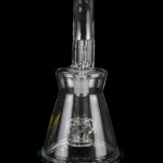 Clear glass water pipe (rig) with intricate percolator, isolated on black.