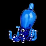 A detailed, angled view of the Octopus Themed Directional Carb Cap, showcasing its blue, swirling design against a black background.
