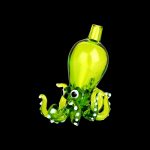 A close-up shot of the Octopus Themed Directional Carb Cap, showcasing its intricately shaped, green glass design against a black background.