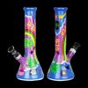 Colorful glass bong with “420” and cannabis leaf designs, studio shot on a black background.