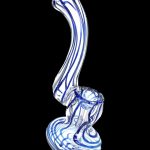 Blue and white glass bubbler pipe for smoking cannabis.