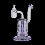 Lavender glass dab rig with quartz banger and water pipe.