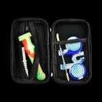 The Portable Silicone Dab Travel Kit is displayed open, revealing a colorful silicone kit neatly arranged inside a zipped black case.