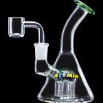 Clear glass dab rig with a quartz banger, featuring a percolator base and branded with "ATOMIK."