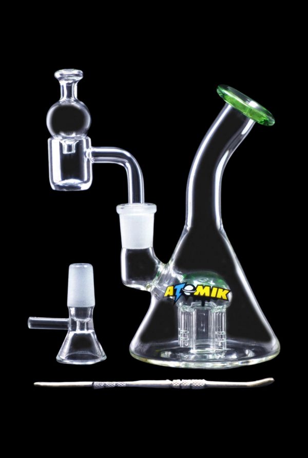 Glass rig with attachments for dabbing cannabis concentrates.