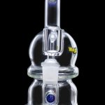 Clear glass dab rig with blue accents, featuring a bubbler design and intricate glasswork.