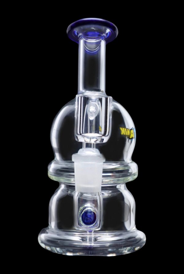 Clear glass dab rig with blue accents, featuring a bubbler design and intricate glasswork.