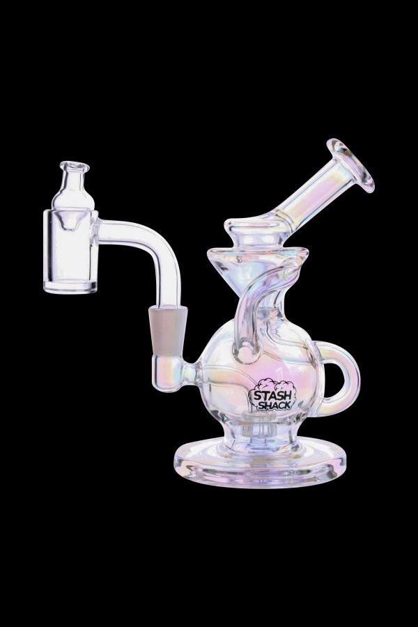 Iridescent glass dab rig with a quartz banger, branded with “Stash Shack.”