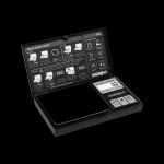 A Truweigh Grand Classic digital scale with a black protective case, displaying “0.00” on the screen, alongside a quick start guide with calibration and weighing instructions.