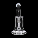 Clear glass dab rig with etched logo, isolated on black.
