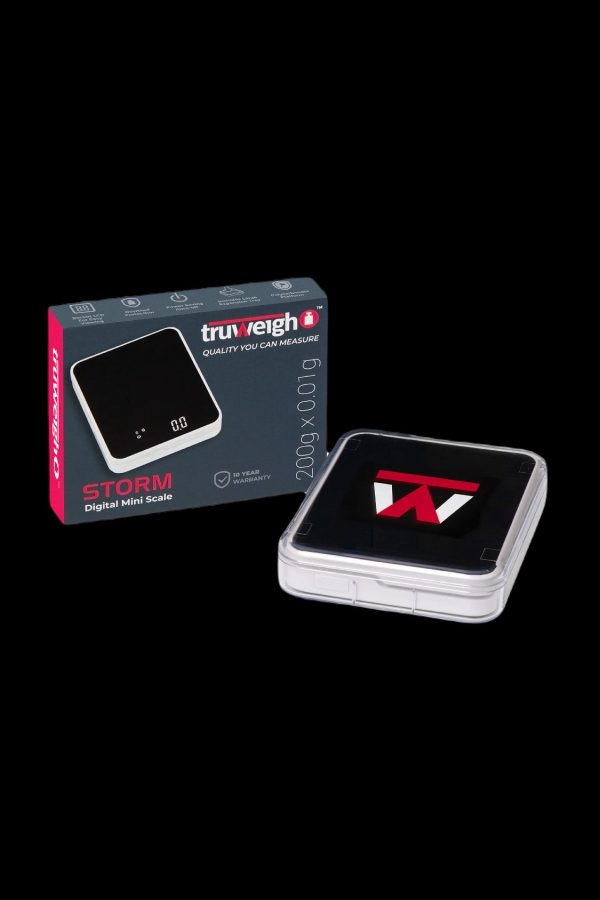 Black and red Truweigh Storm digital scale for measuring cannabis, displayed in its box.