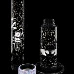 Glass bong with a colorful spiderweb design and a matching ash catcher, against a black background.