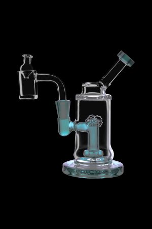 A vibrant teal glass dab rig with a complex bubbler design, isolated on a black background.