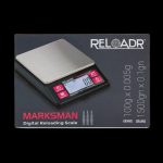 Digital scale for measuring cannabis, displaying weights in grams and grains.