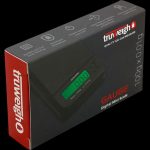 Front view of the Truweigh Gauge Digital Mini Scale, showing its sleek, compact design and branding on a dark background.