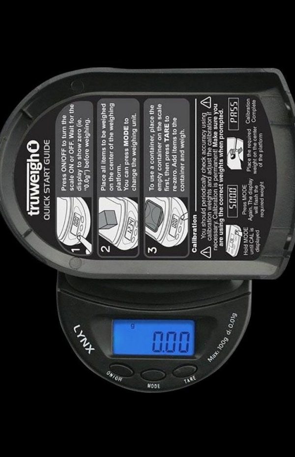 Close-up of the Truweigh Lynx Digital Mini Scale displaying "0.00" with instruction labels surrounding the digital face.