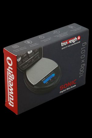 The Truweigh Sonic Digital Mini Scale is shown in a close-up, angled shot with a black background and visible digital display.