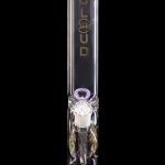 Purple and clear glass bong with intricate percolator details.