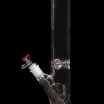 Red glass water pipe (bong) with ice pinches and a removable downstem.