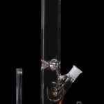 Red glass bong with diffuser downstem and separate glass pieces.