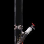 Red-accented glass water pipe (bong) for cannabis use.