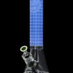 Blue glass bong with honeycomb filtration and a green accent.