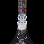 Glass bong with colorful geometric patterns and percolator.