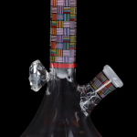 Black glass bong with colorful geometric patterns and ice catcher.