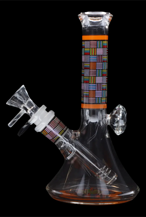 Glass water pipe with colorful geometric patterns, isolated on black.