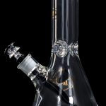 Clear glass bong with intricate bubble detailing and a blue mouthpiece, displayed against a black background.
