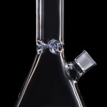 Clear glass bong with blue accents, isolated on black.