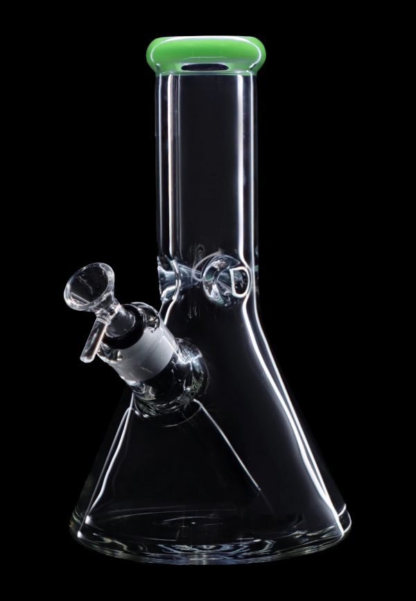 Clear glass bong with a green mouthpiece and ice catcher, isolated on a black background.