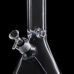 Clear glass bong with a purple mouthpiece and ice catcher.