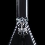 Clear glass bong with a purple rim and ice catcher, isolated on black.