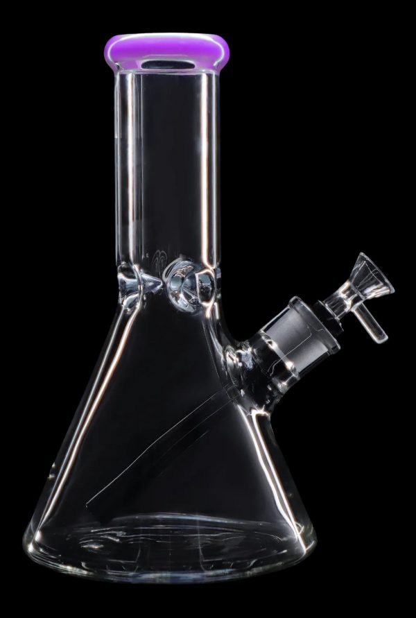 Glass bong with a flared base and purple mouthpiece, isolated on black.