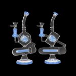 Two glass cannabis water pipes (bongs) with blue accents on a black background.