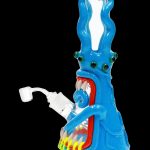 Blue glass water pipe shaped like an octopus with a clear mouthpiece and intricate detailing.