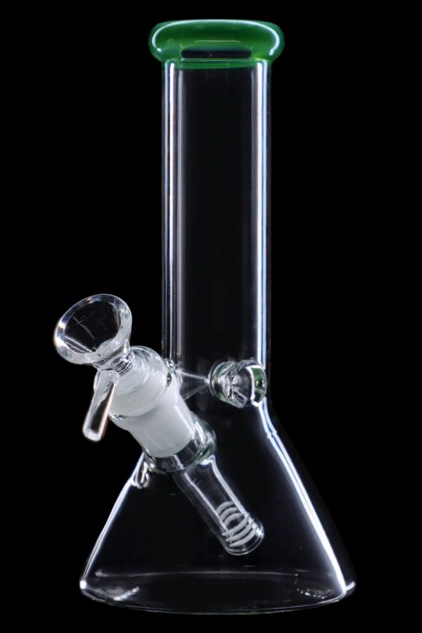 Clear glass bong with a green mouthpiece and intricate glass detailing.