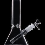 Clear glass bong with a downstem, isolated on a black background.