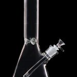 Clear glass bong with a flared base and downstem against a black background.