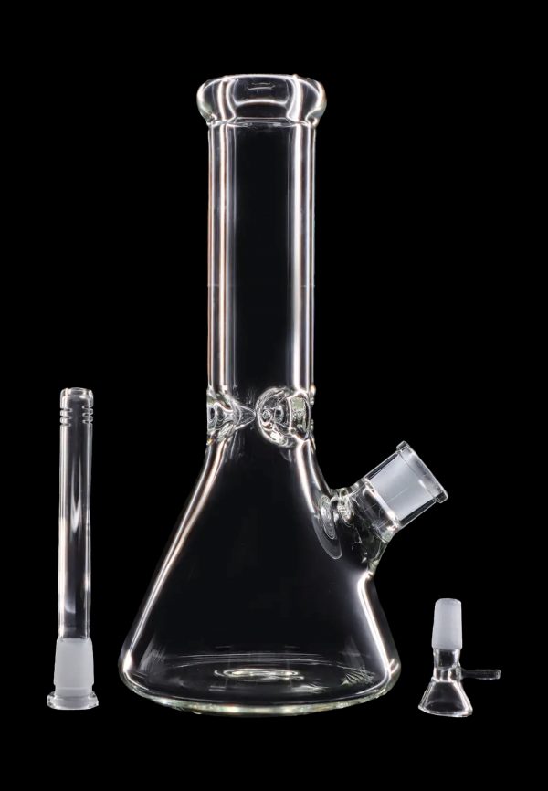 Clear glass bong with downstem and bowl, isolated on a black background.