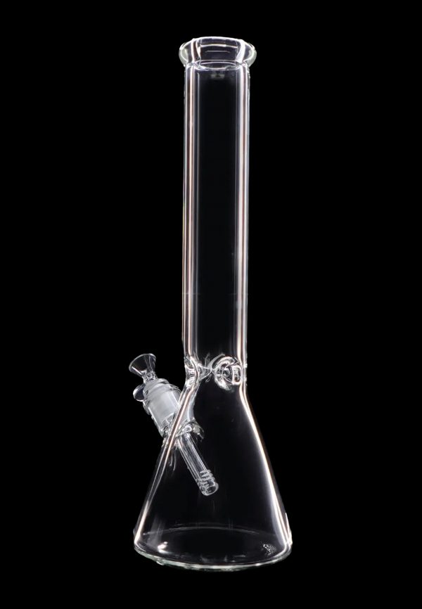 Clear glass bong against a black background.