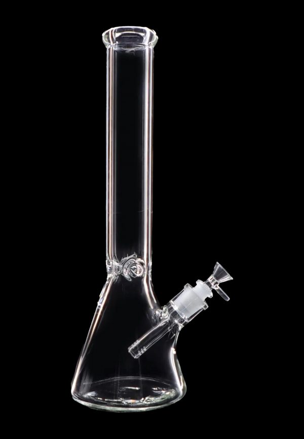 Clear glass bong against a black background.