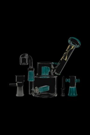 A detailed, angled view of the Evolution Morning Glory Sidecar Dab Rig in clear glass, with visible joints and a compact design.