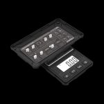 The Truweigh Riot Scale - 100g x 0.01g is shown in a top-down view, featuring a digital display and black finish.