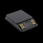 Black digital scale with buttons, likely for weighing cannabis."