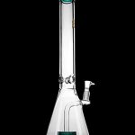 Clear glass bong with a wide base and intricate detailing.