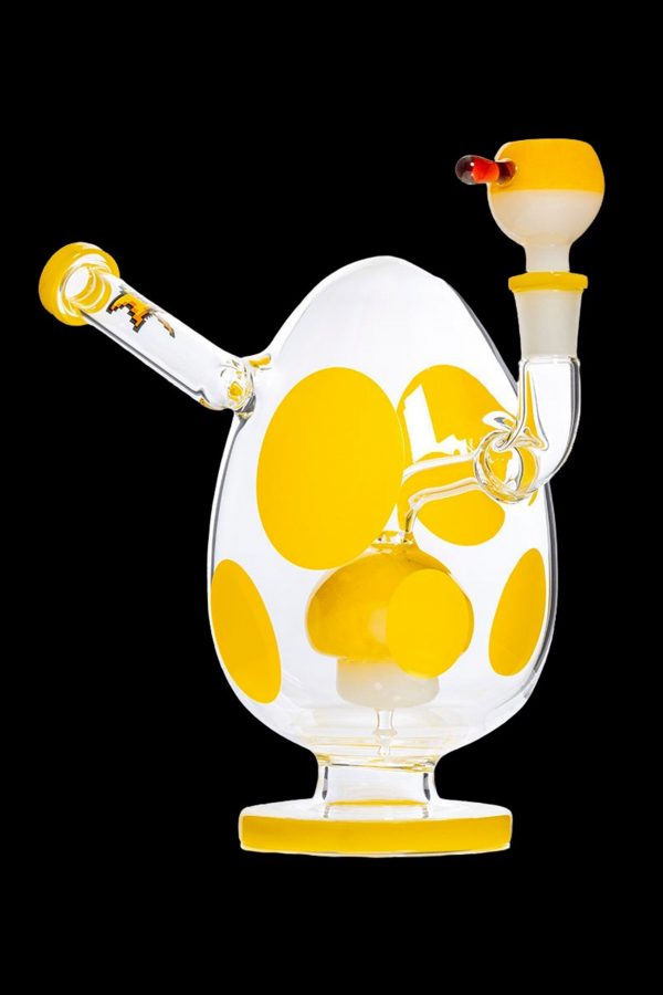 Yellow glass water pipe with polka dot design.