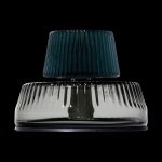 Green and clear glass water pipe against a black background.